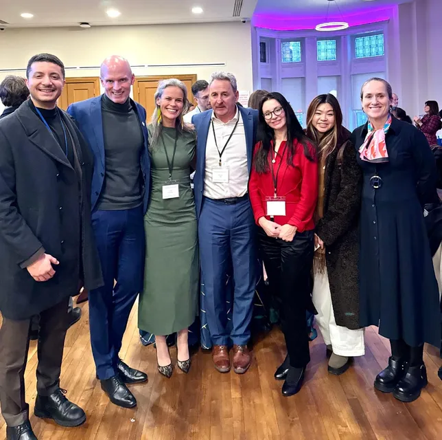 Adriana with colleagues at a conference